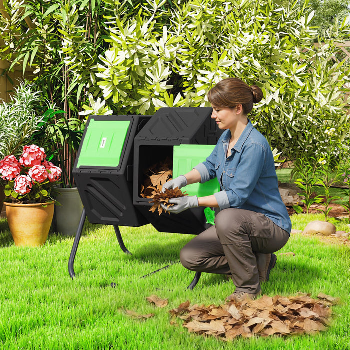Outsunny 34.5 Gallon Dual Chamber Compost Bin, Rotating Composter, Compost Tumbler with 24 Ventilation Openings and Steel Legs, Green