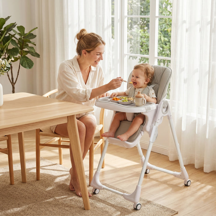 Qaba Baby High Chair, Foldable Dining Booster Seat with Adjustable Seat Height, Backrest, Footrest and Tray, Removable Double Tray, Wheels for Babies 6-36 Months, Light Grey