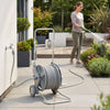 Outsunny Garden Hose Reel Cart with Wheels, 1/2" x 148ft Water Hose Reel Cart with 2 Patterns Nozzle, Faucet Adaptors and Rewind Handle for Outdoor Patio Watering, Cleaning, Grey