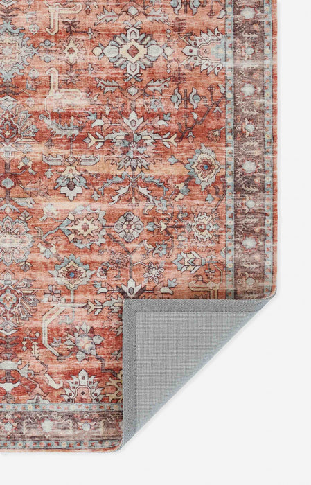 Ruby Traditional 6'6\" x 9'0\" Area Rug in Brown Indoor Area Rug