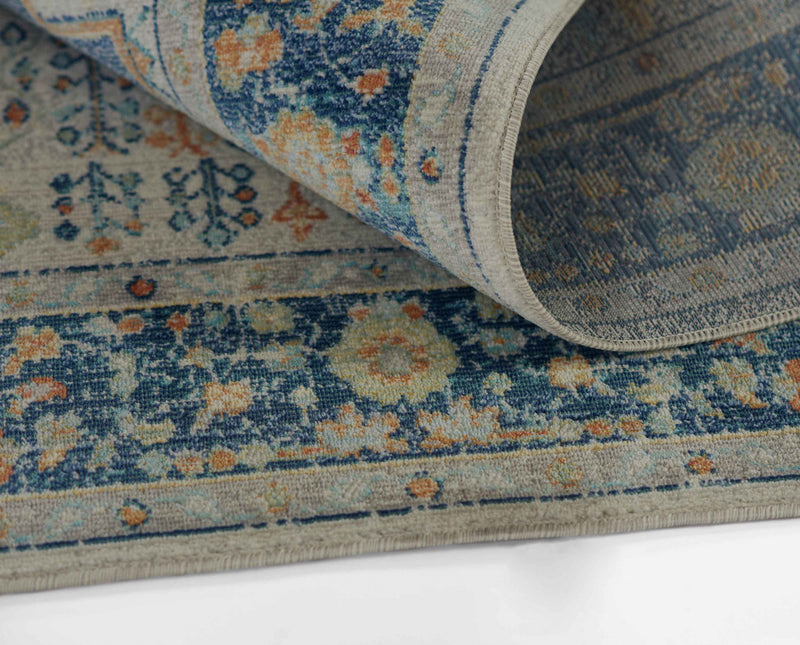 Kinsley Traditional 6'7\" x 9'6\" Area Rug in Blue Indoor Area Rug