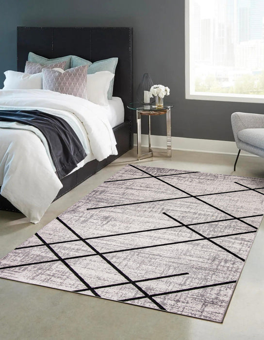 Damali Ivory/Black Machine Washable Area Rug - 5'0\" x 7'0\"