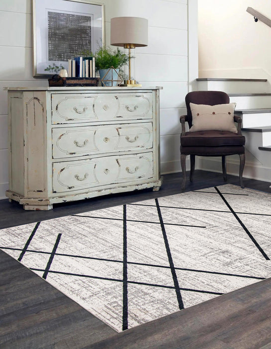 Damali Ivory/Blue Machine Washable Area Rug - 6'0\" x 9'0\"