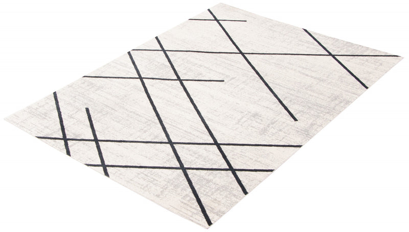 Damali Ivory/Blue Machine Washable Area Rug - 6'0\" x 9'0\"