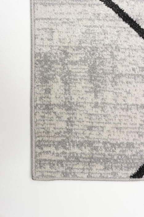 Damali Ivory/Black Machine Washable Area Rug - 2'6\" x 8'0\"