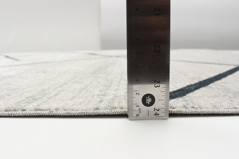 Damali Ivory/Blue Machine Washable Area Rug - 6'0\" x 9'0\"