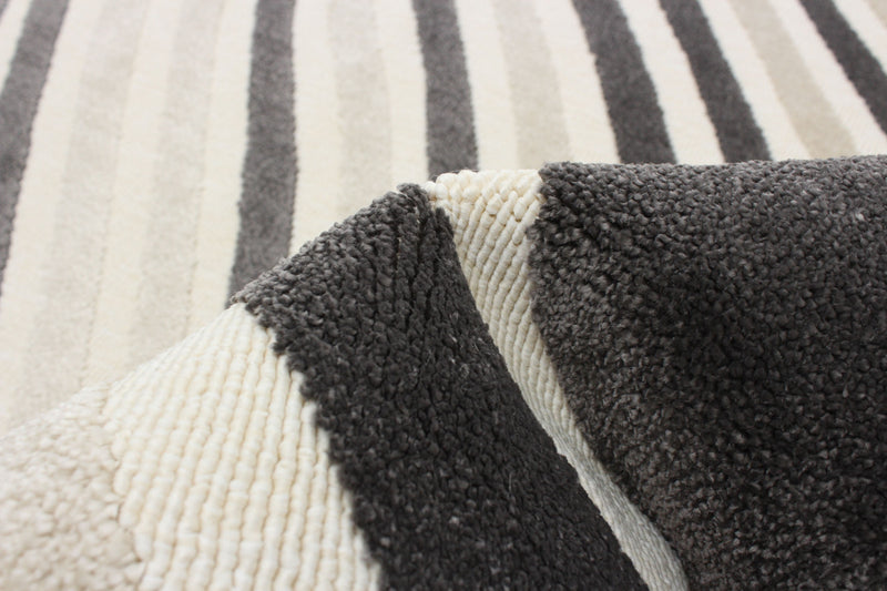 Nikkos Taupe 4'7\" x 6'7\" Area Rug