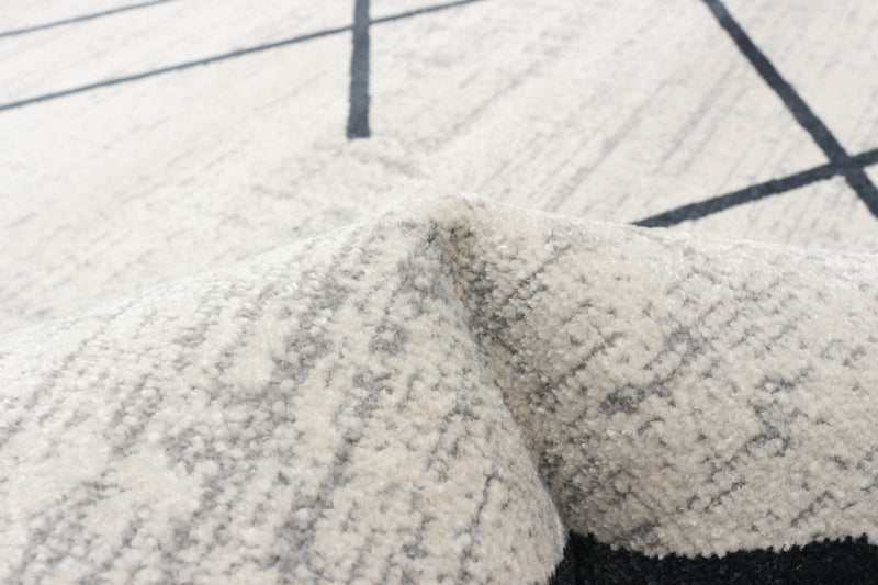 Damali Ivory/Blue Machine Washable Area Rug - 6'0\" x 9'0\"