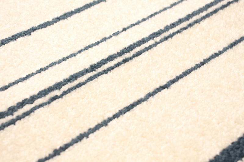 Faith Cream-Prol Area Rug - 3'11\" x 5'7\"