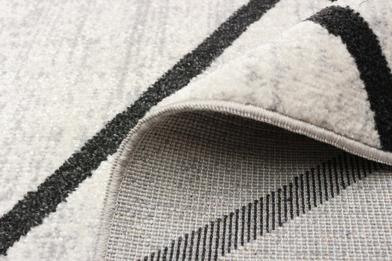 Damali Ivory/Black Machine Washable Area Rug - 6'0\" x 9'0\"