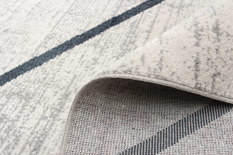 Damali Ivory/Blue Machine Washable Area Rug - 6'0\" x 9'0\"